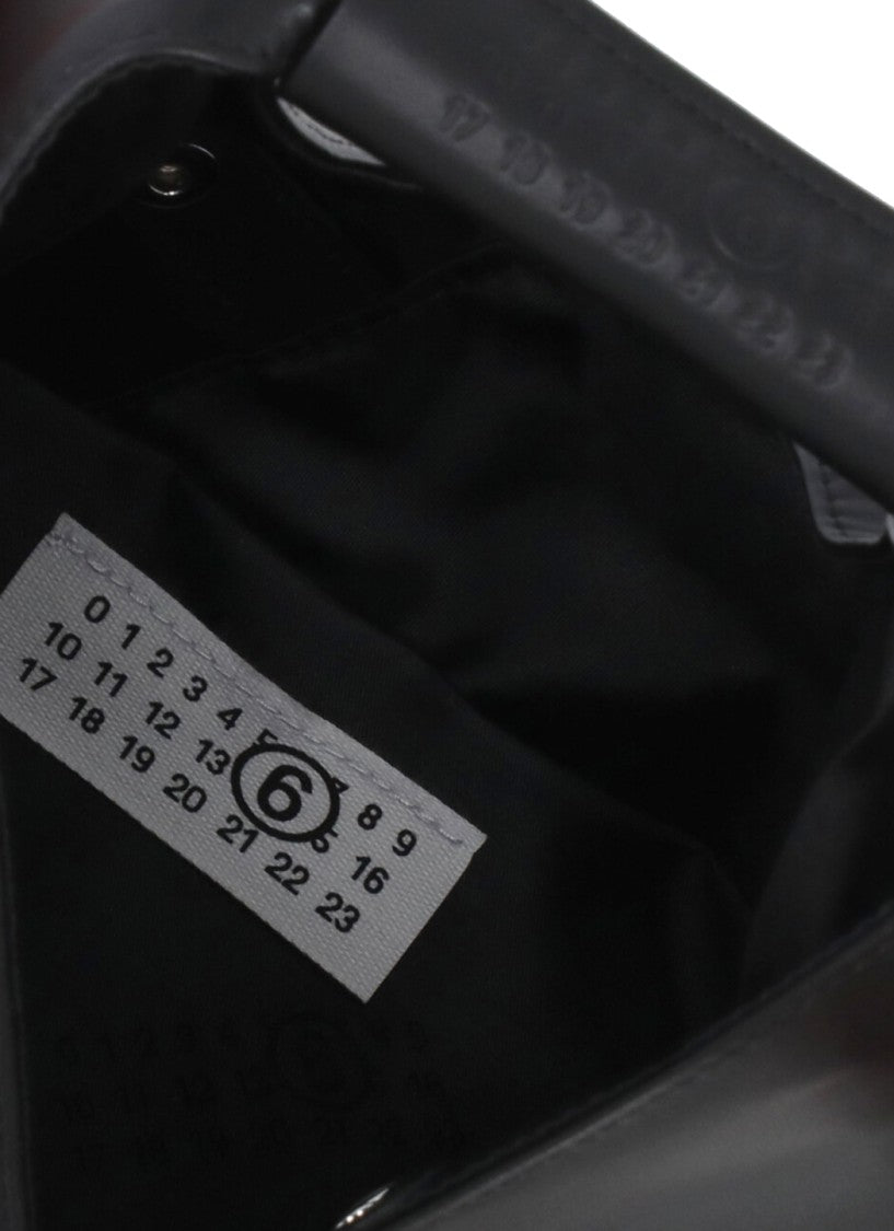 Mm6 By Maison Margiela Triangular Black Handbag With Contrasting Stitching