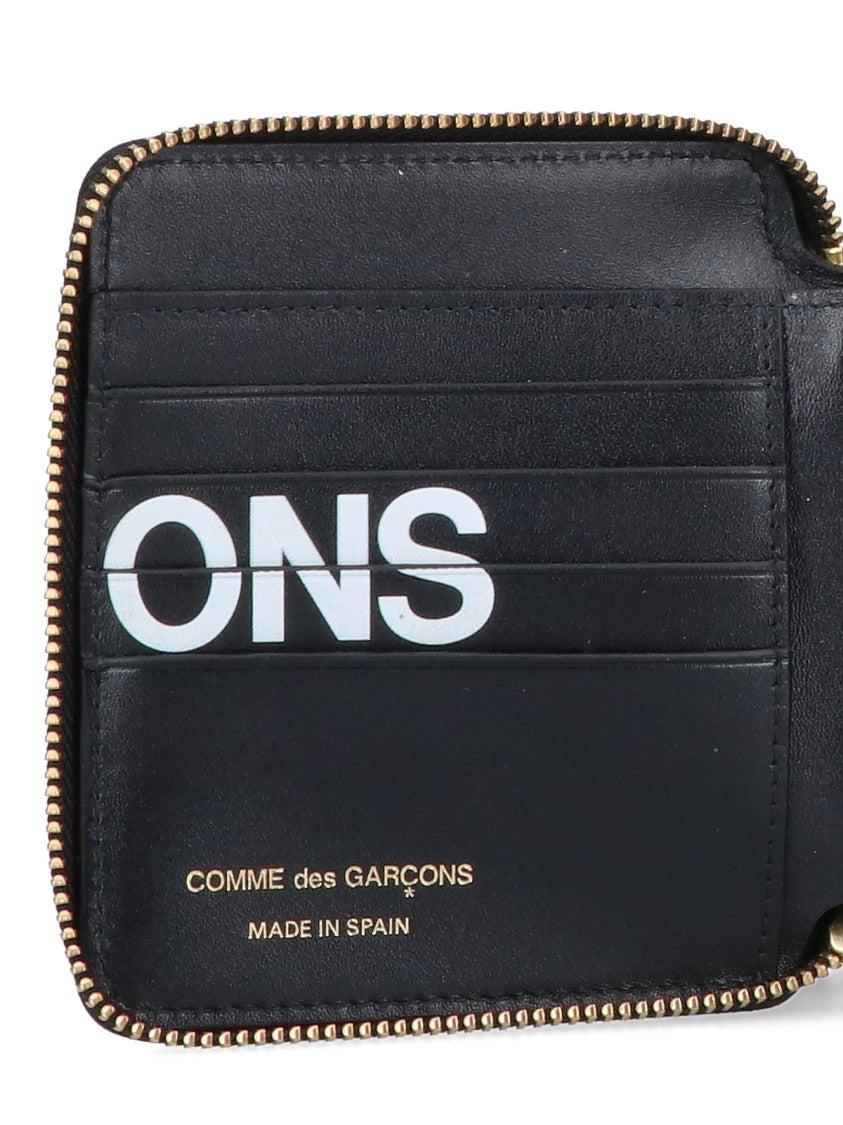 Comme Des Garçons Compact Black Wallet With Zip-Around Closure