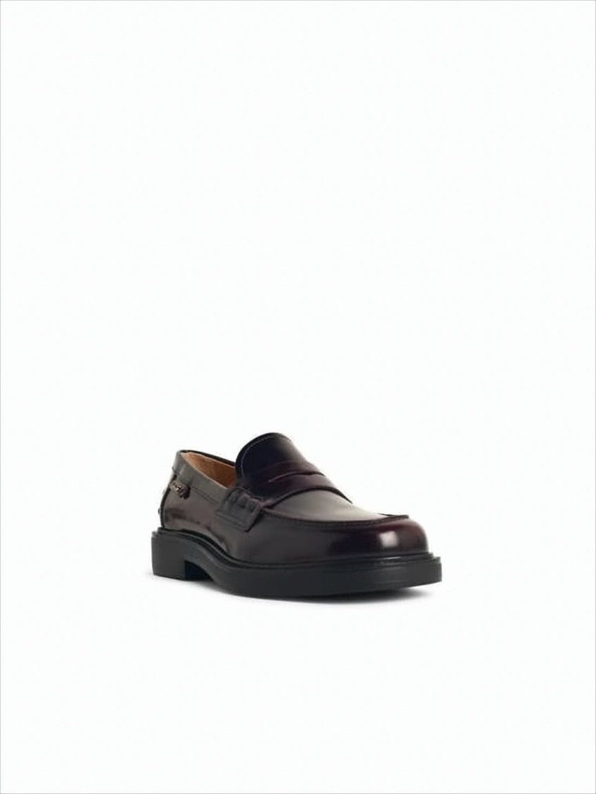 Tod's Polished Burgundy Loafer With Signature Pebbled Sole