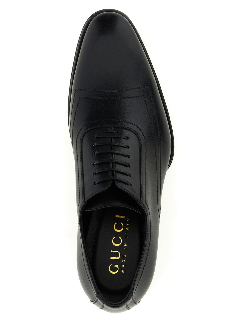 Gucci Lace-Up Leather Shoes With Engraved Gg Logo