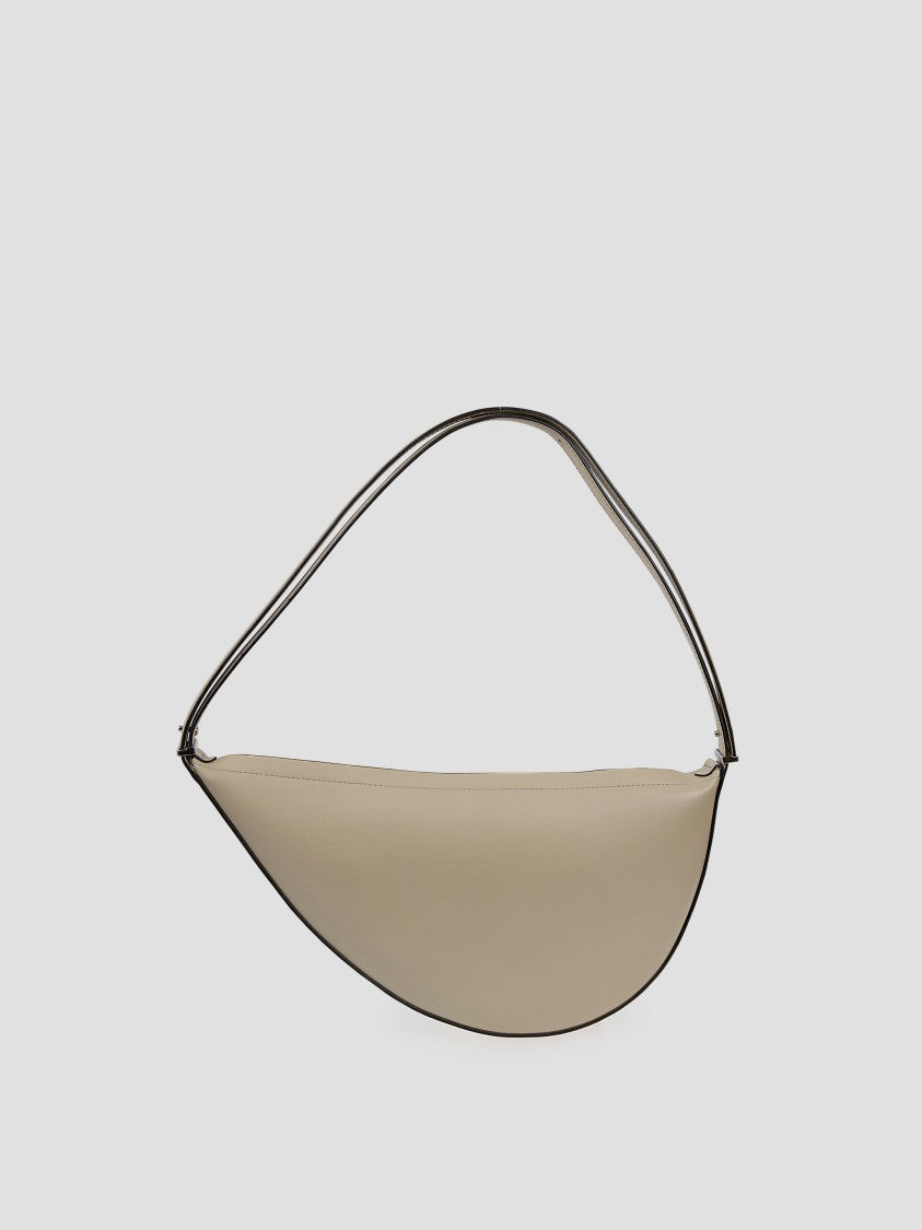 Totême Crescent-Shaped Sling Bag In Smooth Leather