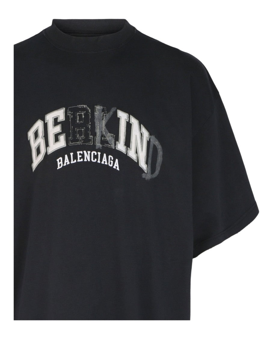 Balenciaga Distressed Black Oversized T-Shirt With Bold Graphic