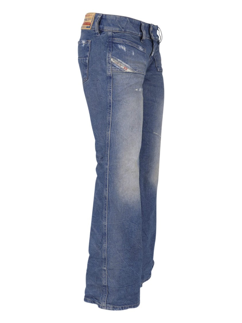 Diesel Flared Blue Wash Jeans With Vintage Distressing