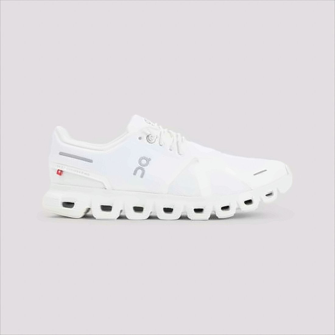 On Running Breathable White Sneakers With Segmented Cushioning