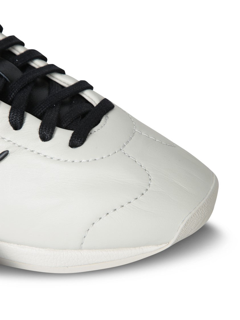 Adidas Minimalist White Sneakers With Signature Detailing