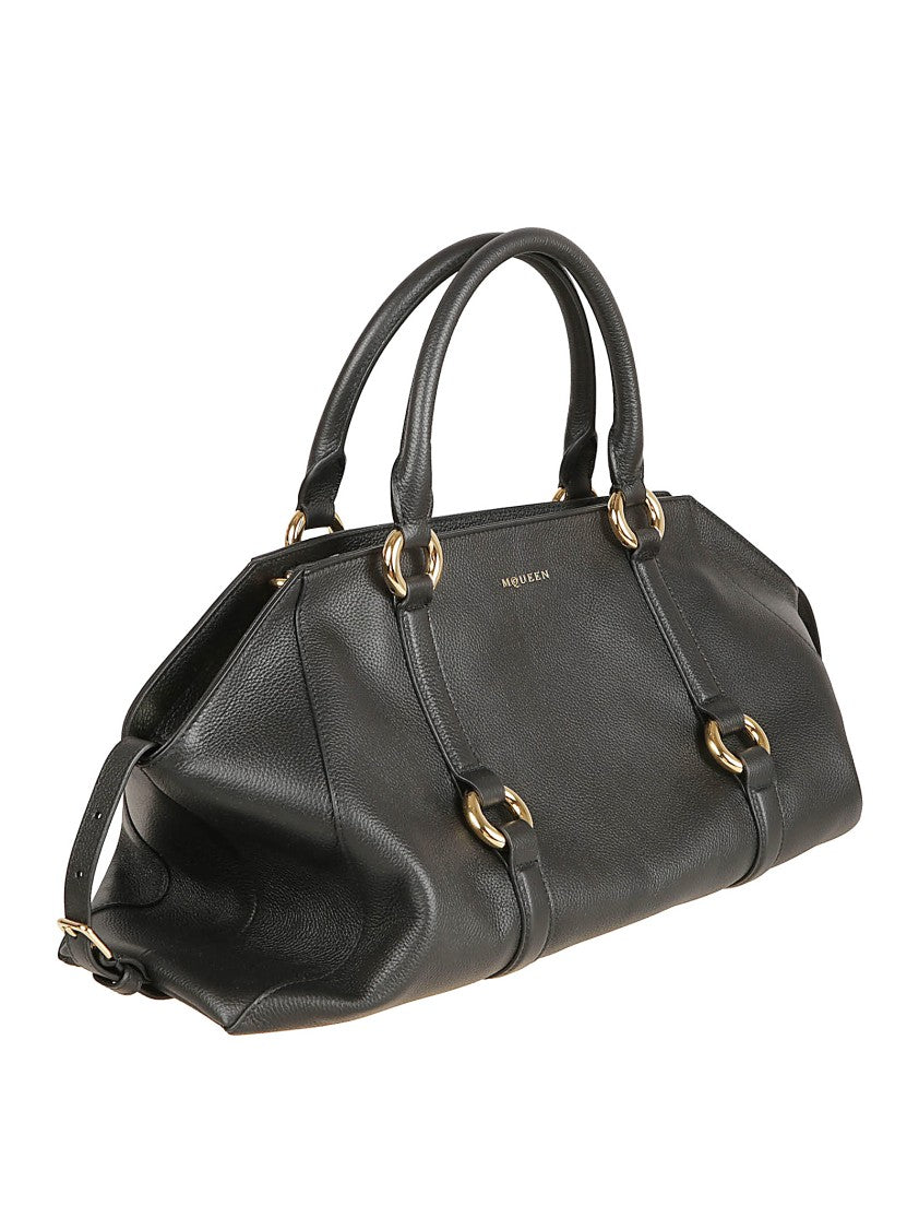 Alexander Mcqueen Elongated Black Calfskin Farringdon Bag With Gold Accents
