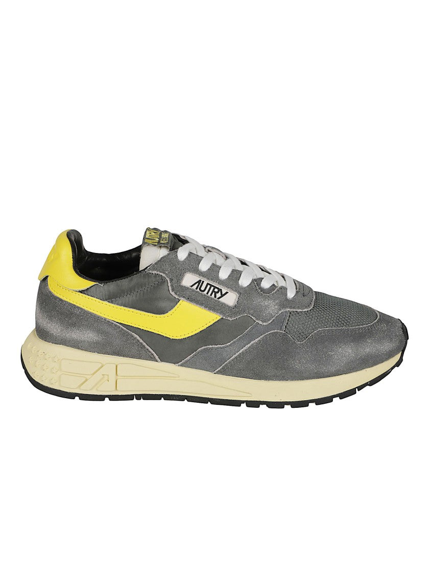 Autry Low-Top Sneakers With Textured Grey Upper And Bold Yellow Accents