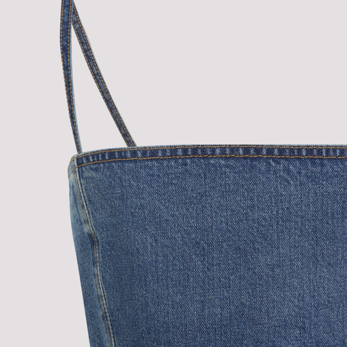 Alaïa Cropped Denim Top With Structured Silhouette