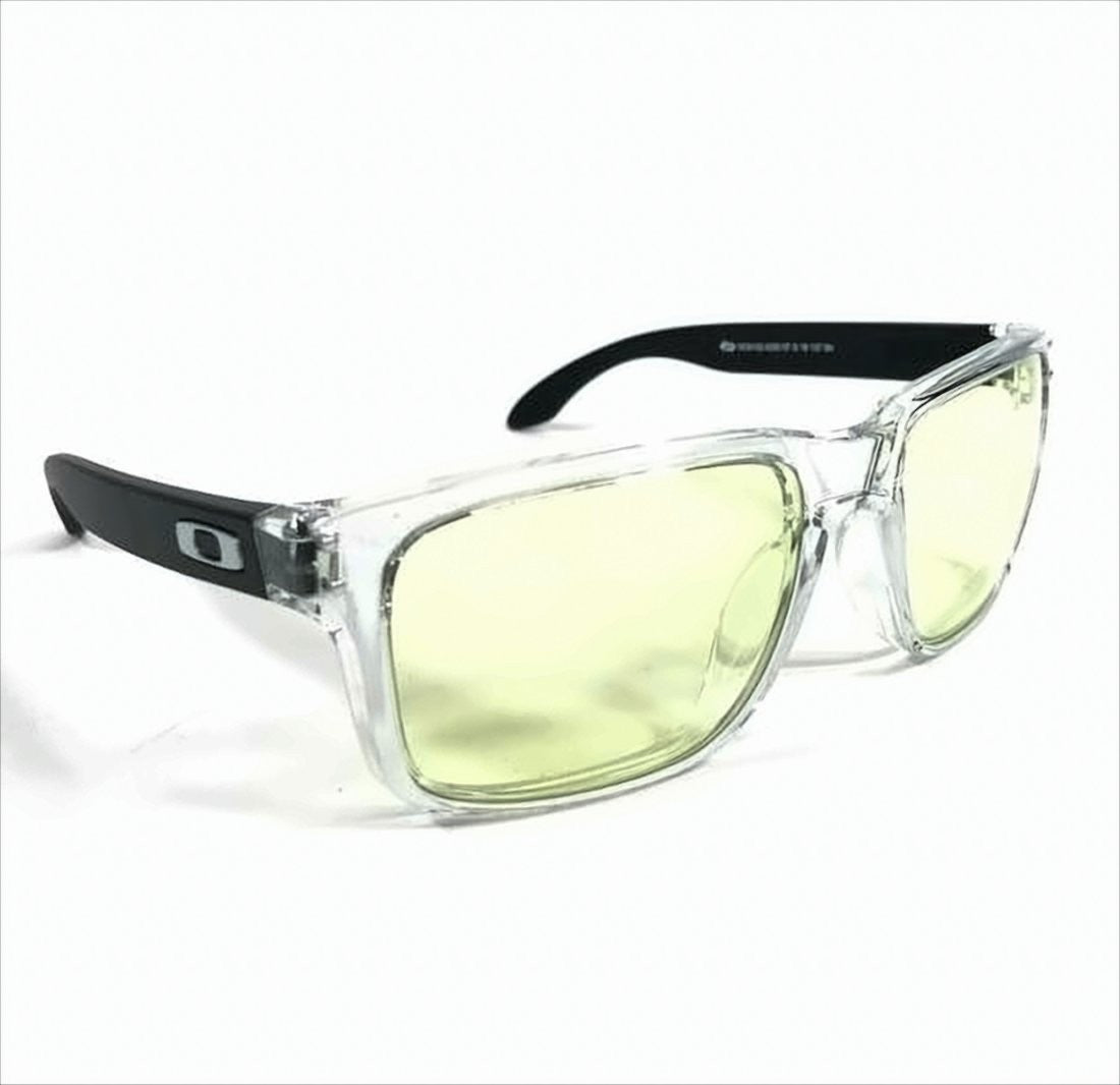 Oakley Transparent Frame Sunglasses With Yellow Tint And Silver Detailing