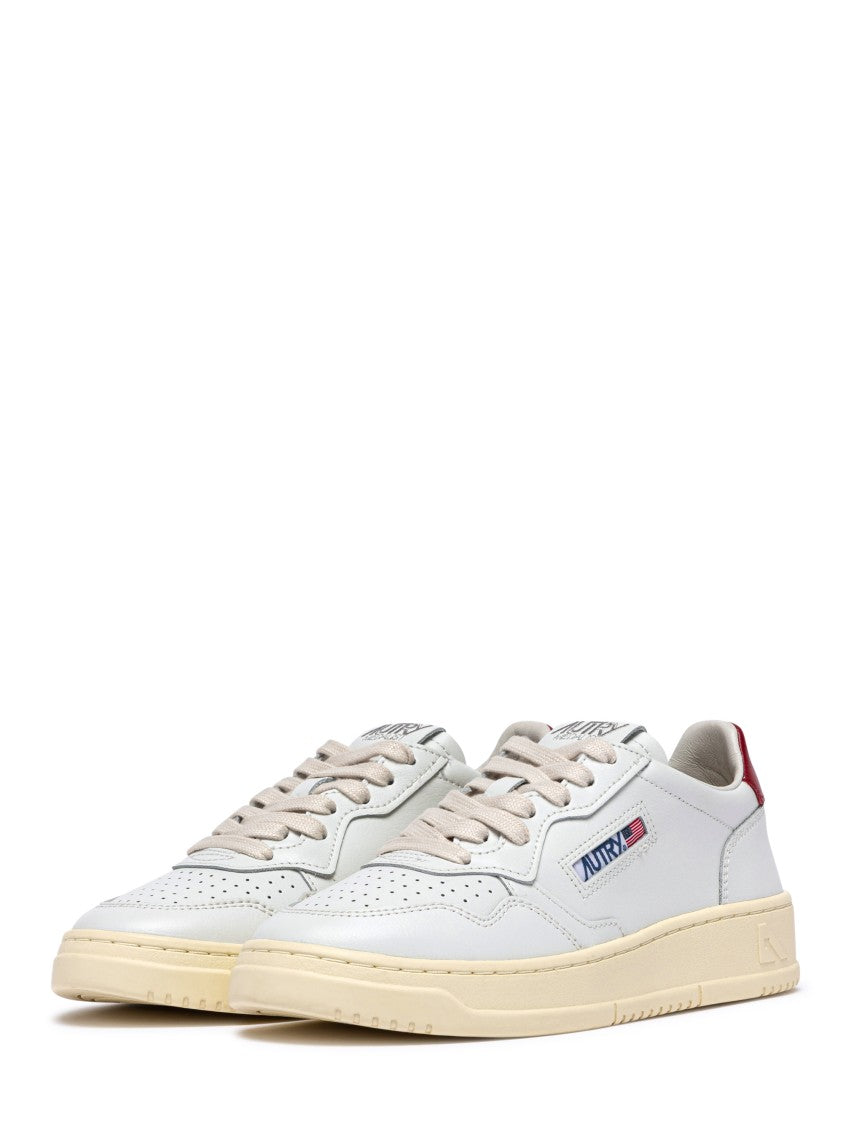 Autry Low-Top Leather Sneakers With Perforated Detailing And Claret Accents