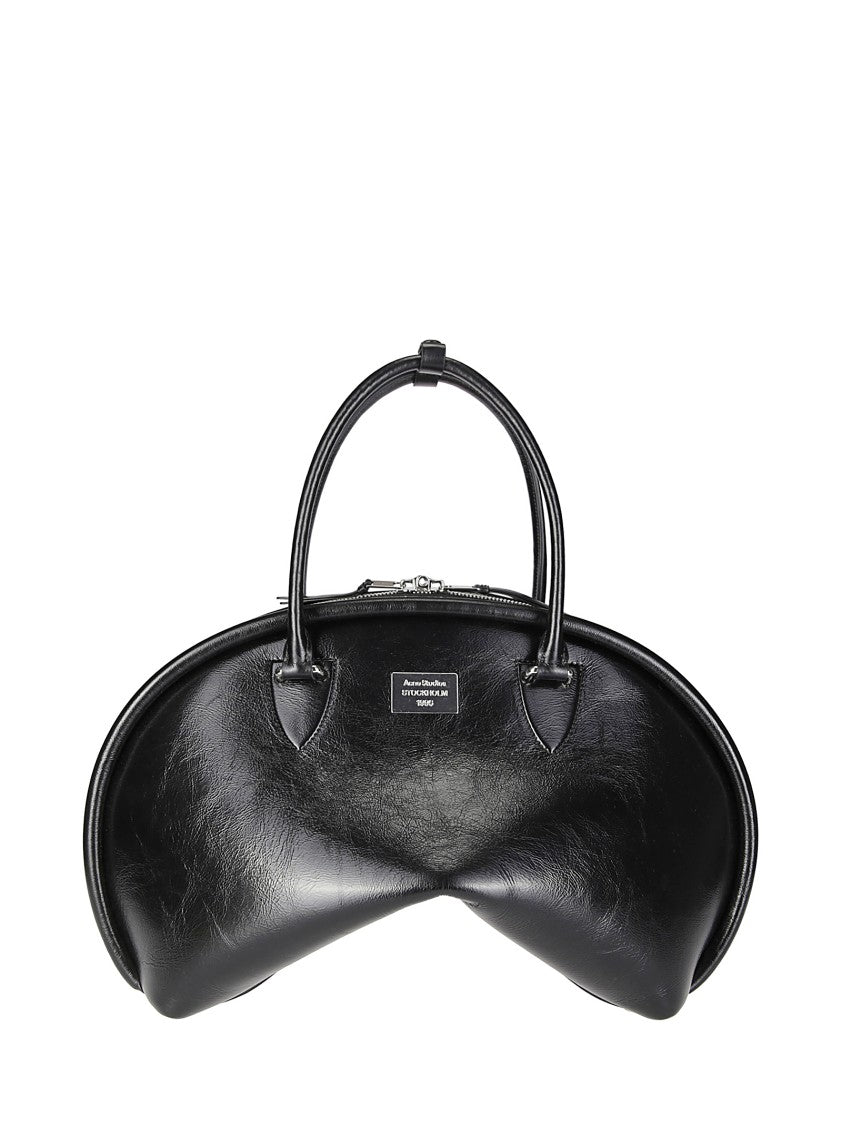 Acne Studios Curved Black Leather Handbag With Metal Plaque