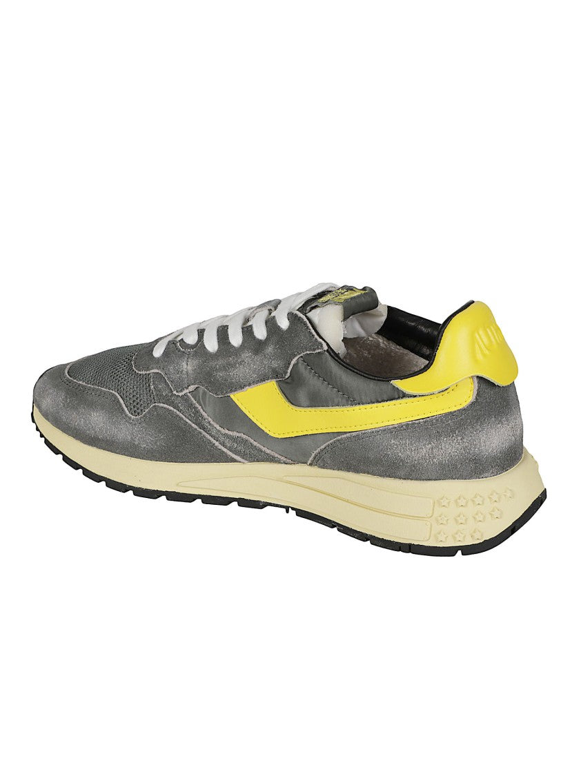 Autry Low-Top Sneakers With Textured Grey Upper And Bold Yellow Accents