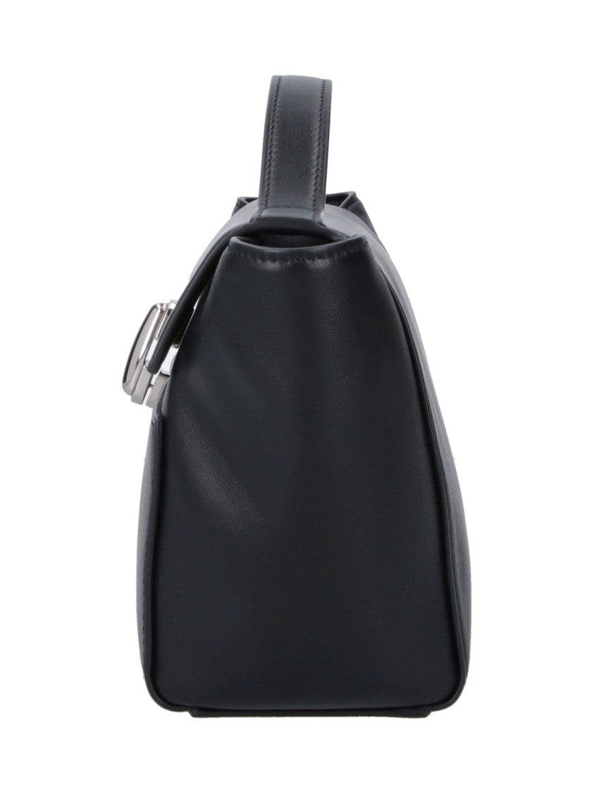 Savette Black Leather Symmetry Trapeze Clutch