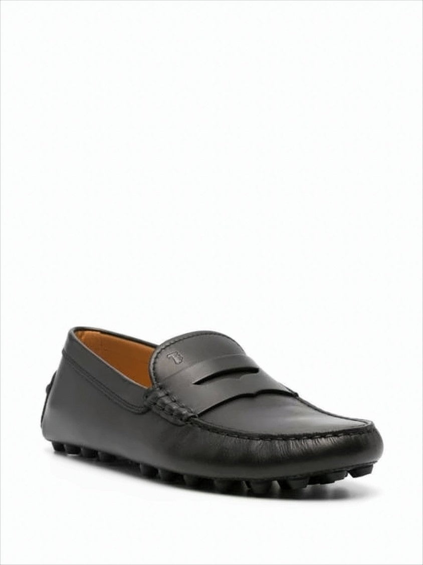 Tod's Penny Strap Black Leather Loafer With Pebbled Sole