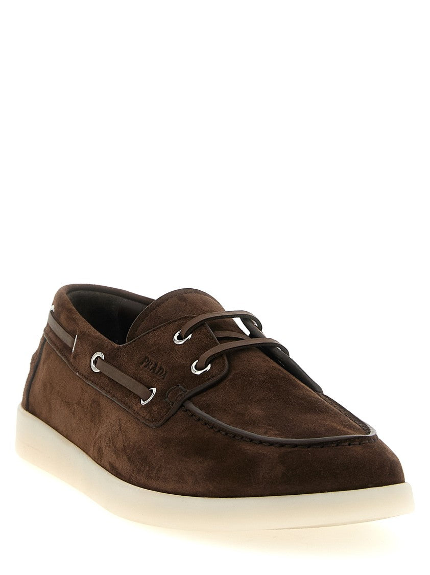 Prada Brown Suede Boat Loafers With Leather Laces And Logo Detail