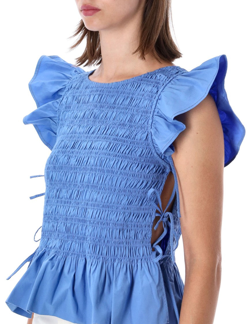 Ganni Textured Smocked Top With Ruffled Sleeves And Tie Details