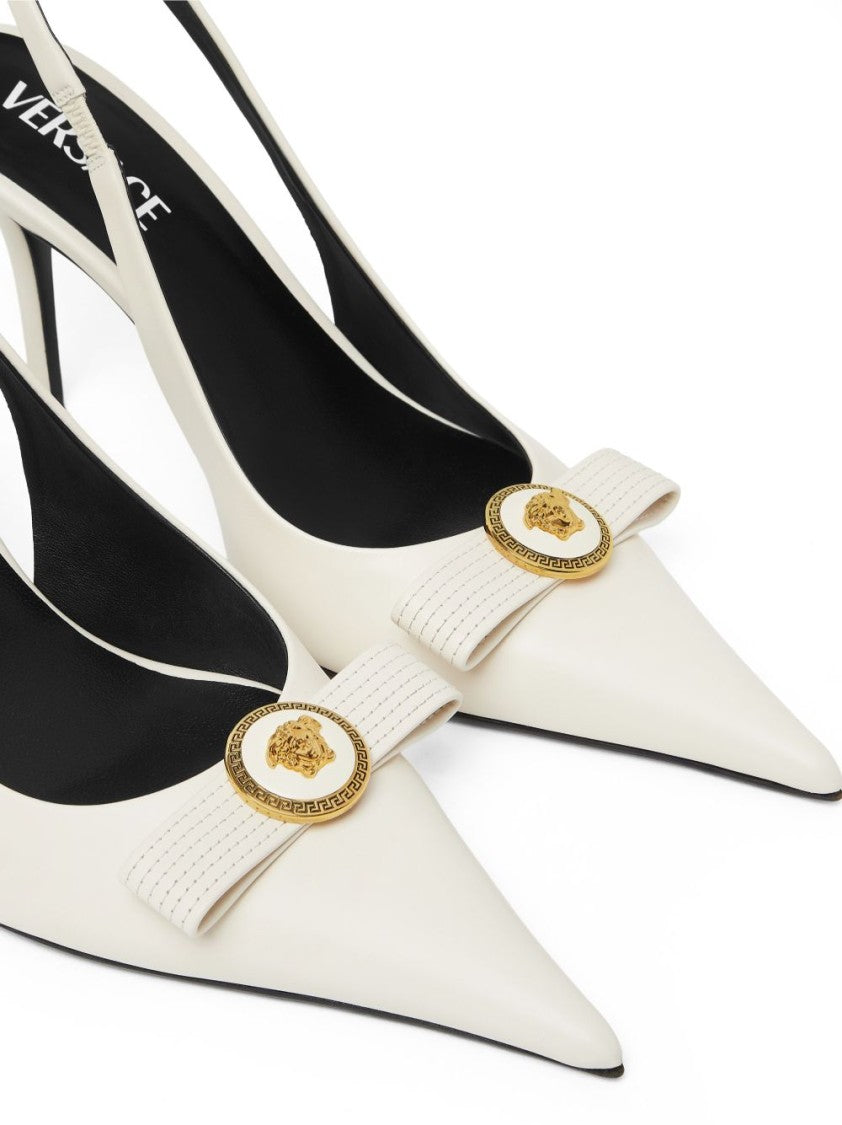 Versace Pointed Toe Slingback Heels With Textured Bow And Gold Medallion