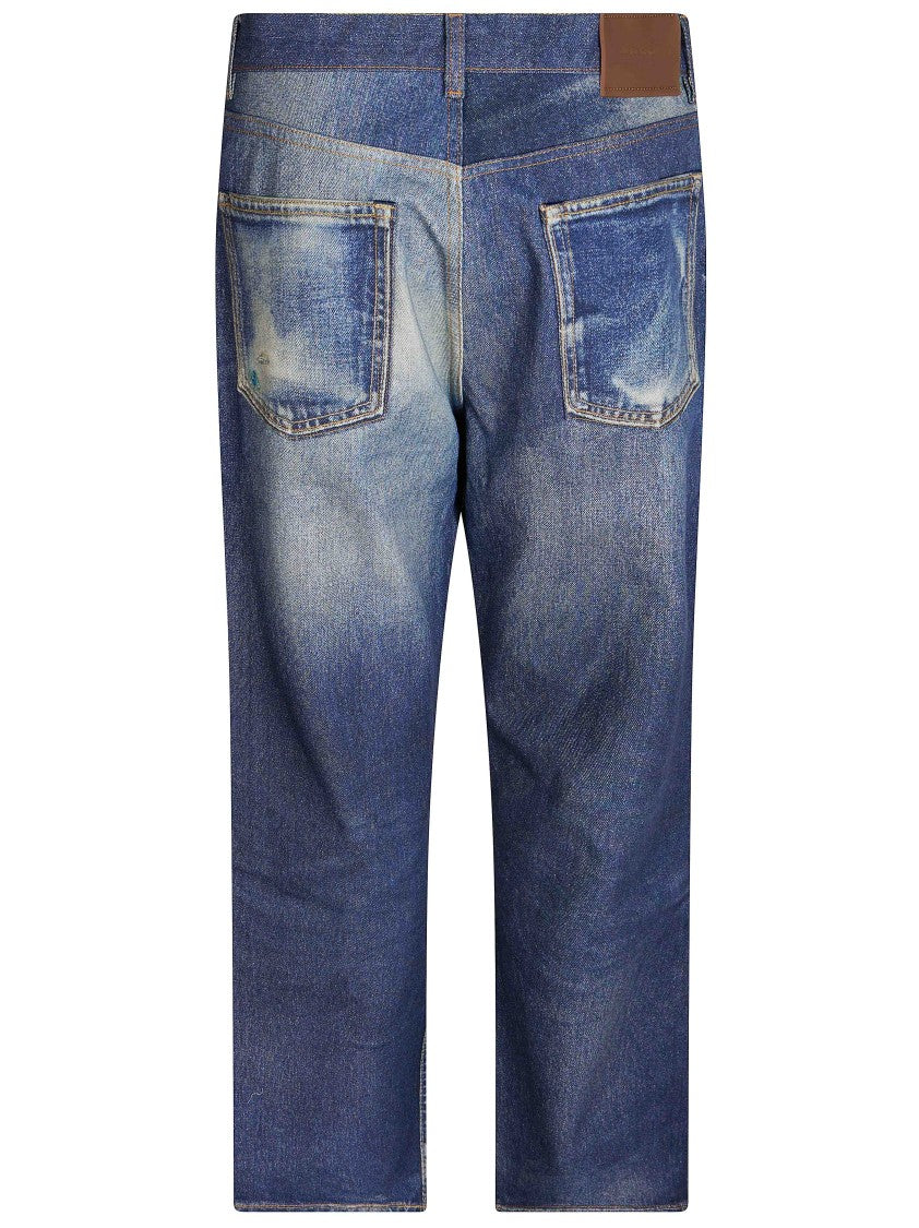 Our Legacy Mid-Wash Denim Jeans With Classic Five-Pocket Design And Distressed Details