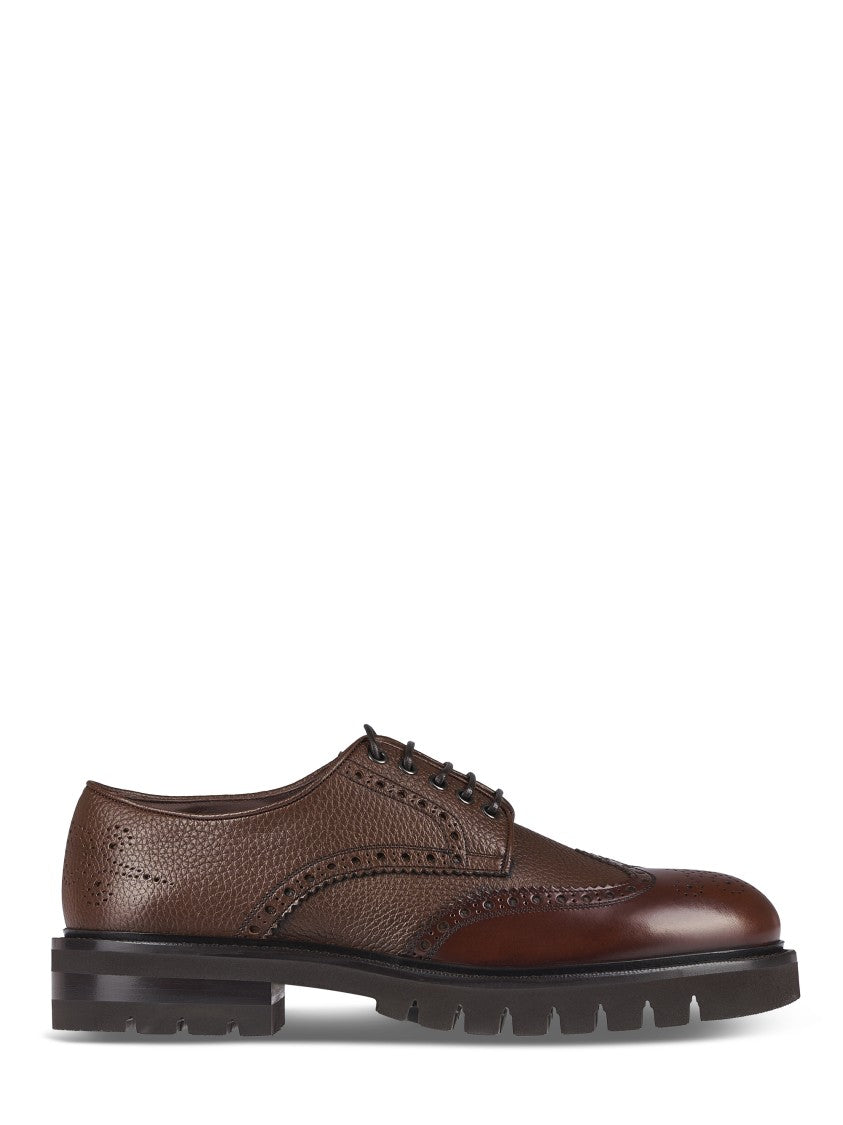 Ferragamo Brogue Leather Flat Shoes With Intricate Perforations
