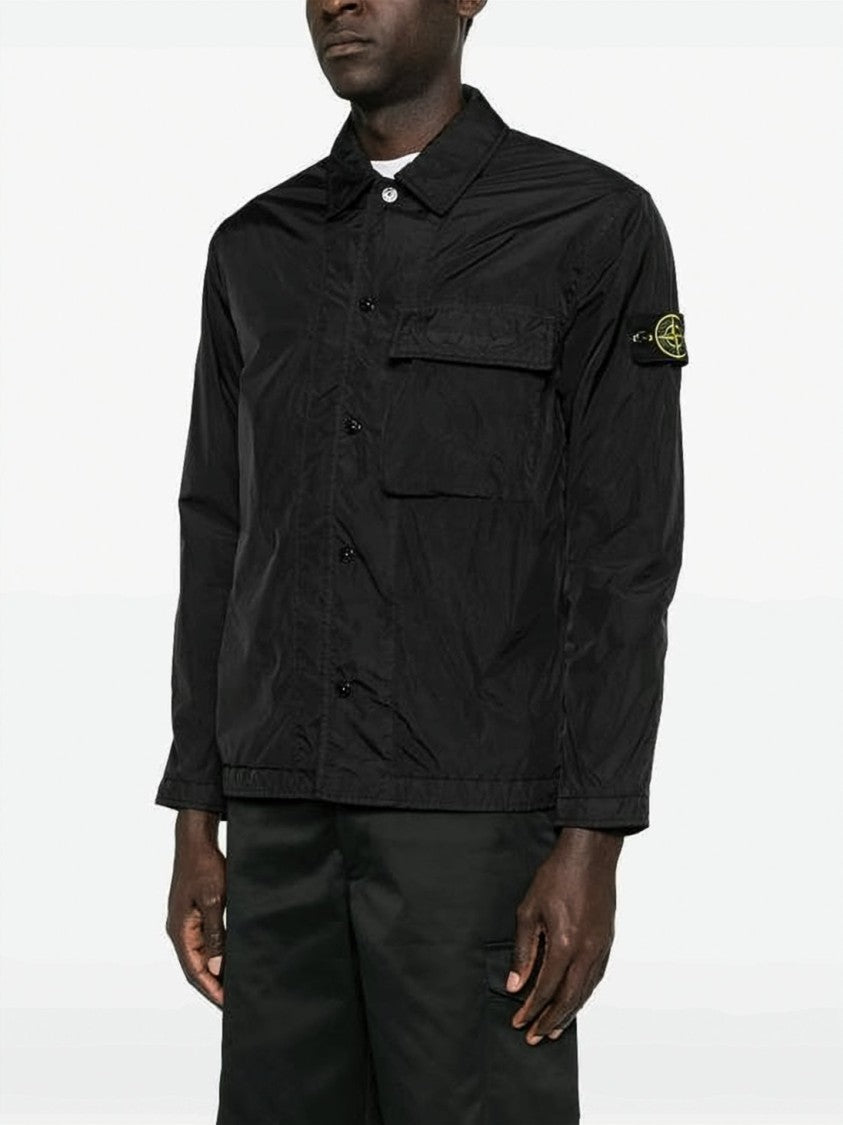Stone Island Black Minimalist Technical Jacket With Flap Pocket And Iconic Patch