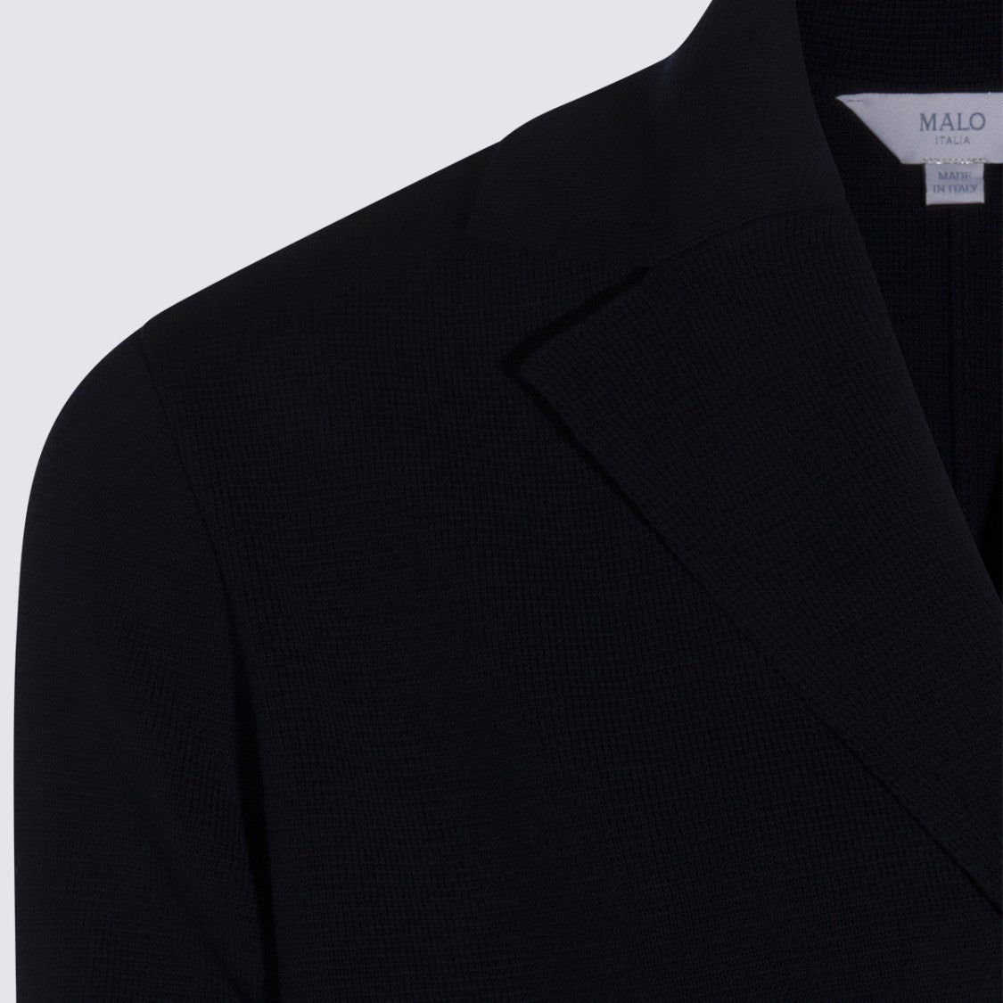 Malo Tailored Minimalist Jacket With Notched Lapel And Three-Button Closure