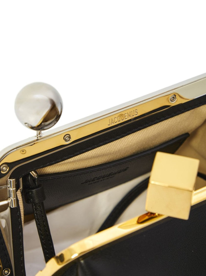 Jacquemus Sleek Black Bag With Metallic Gold Frame And Unique Clasp