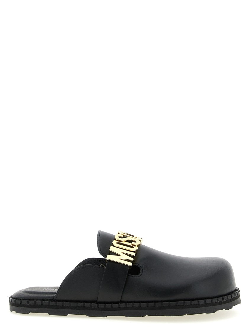 Moschino Closed-Toe Leather Sabots With Metal Logo Strap