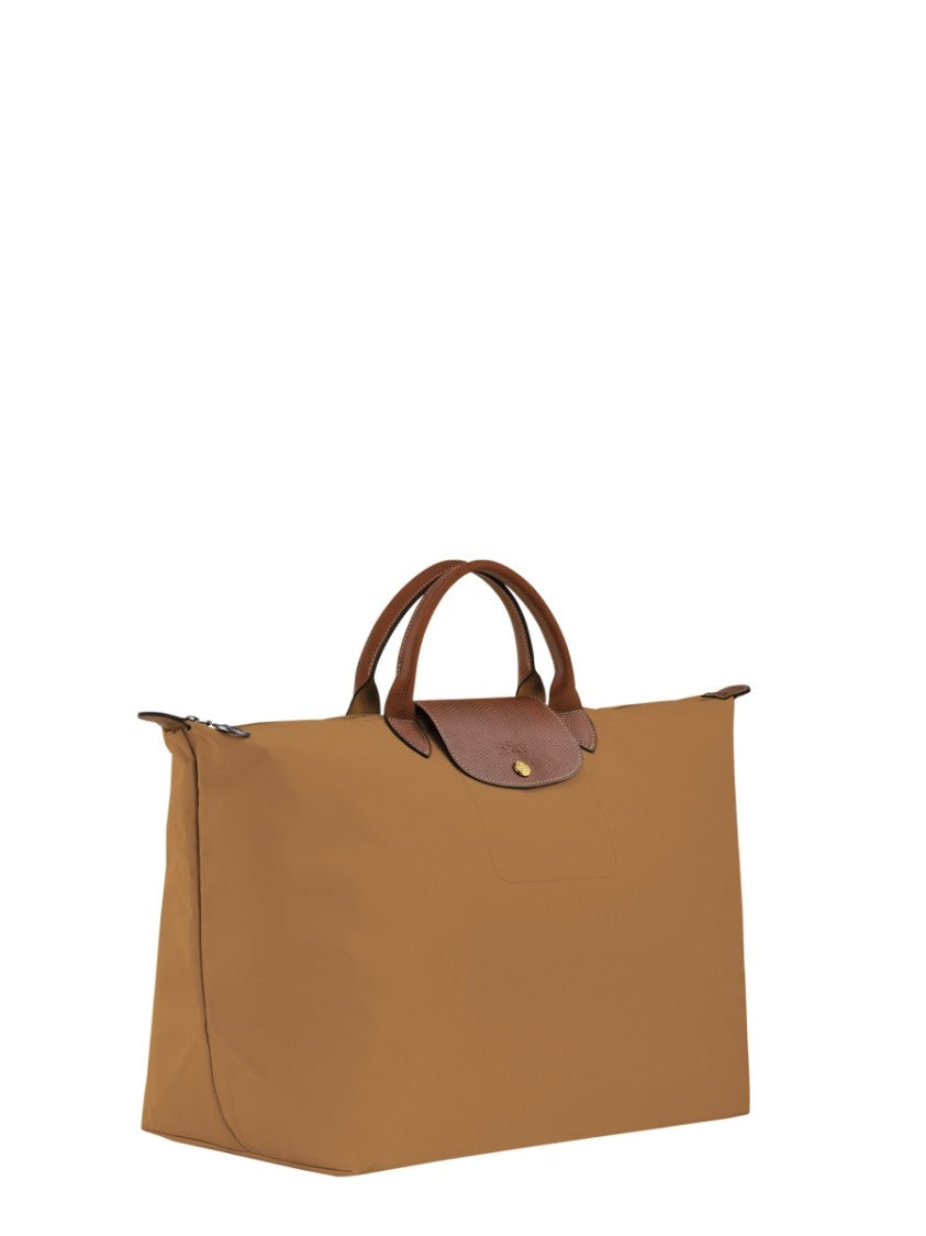 Longchamp Spacious Travel Bag With Structured Silhouette And Leather Accents