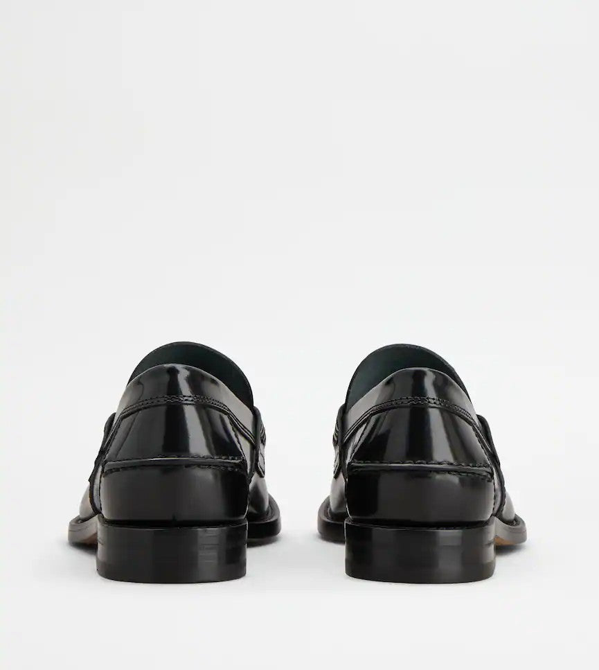 Tod's Timeless Penny Loafers In Polished Black Calfskin