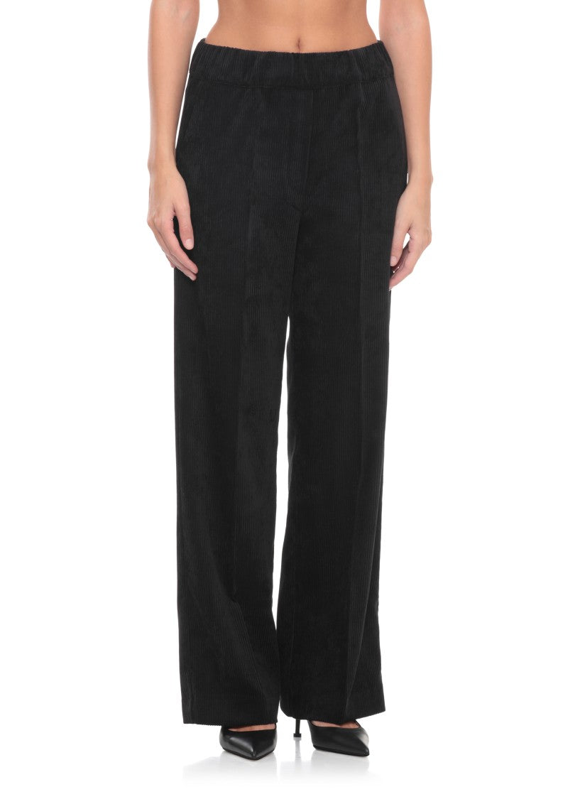 D. Exterior Black Corduroy Pants