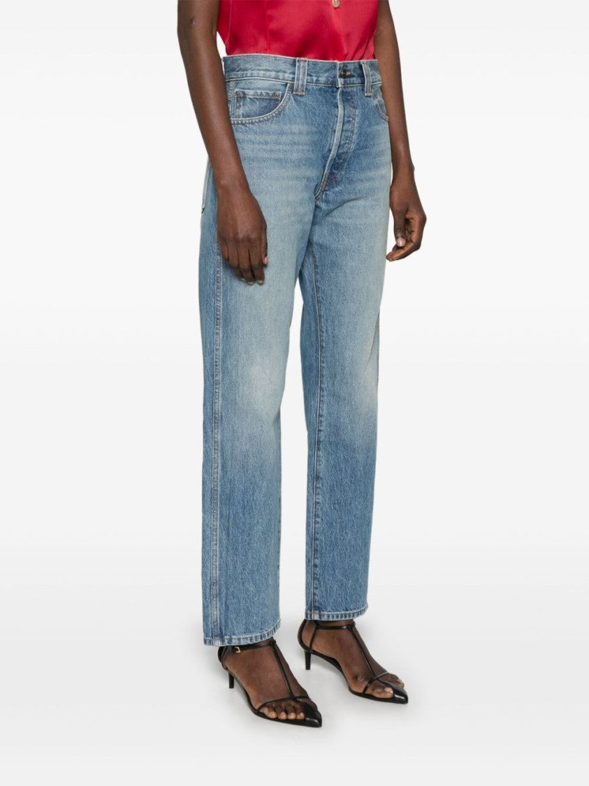 Khaite Relaxed Bow Leg Jeans In Faded Denim