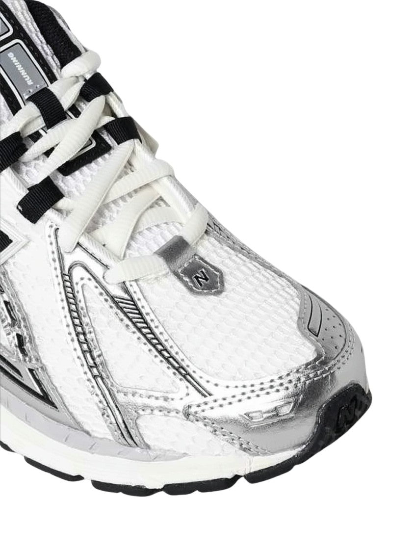 New Balance Sleek White And Silver Sneakers
