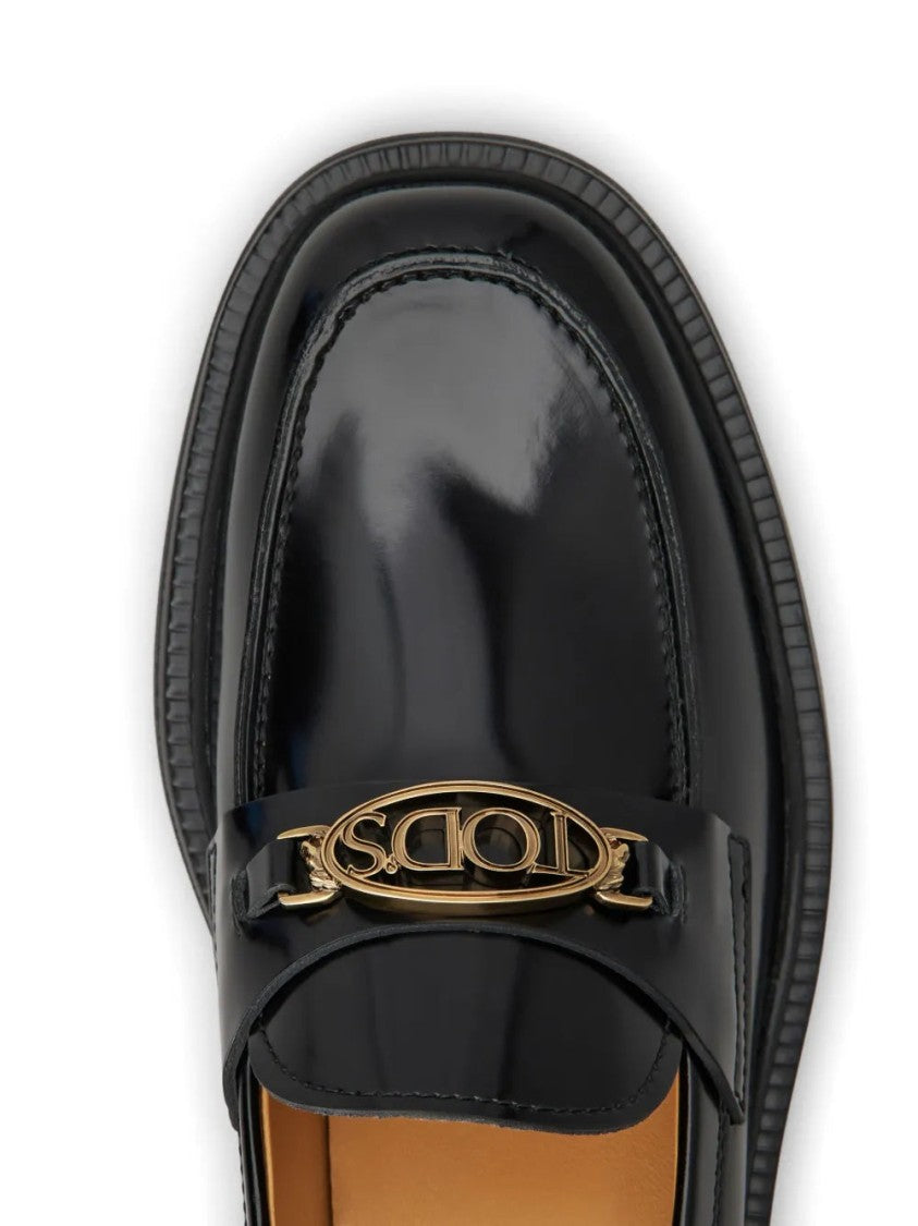 Tod's Glossy Black Leather Loafers With Decorative Emblem