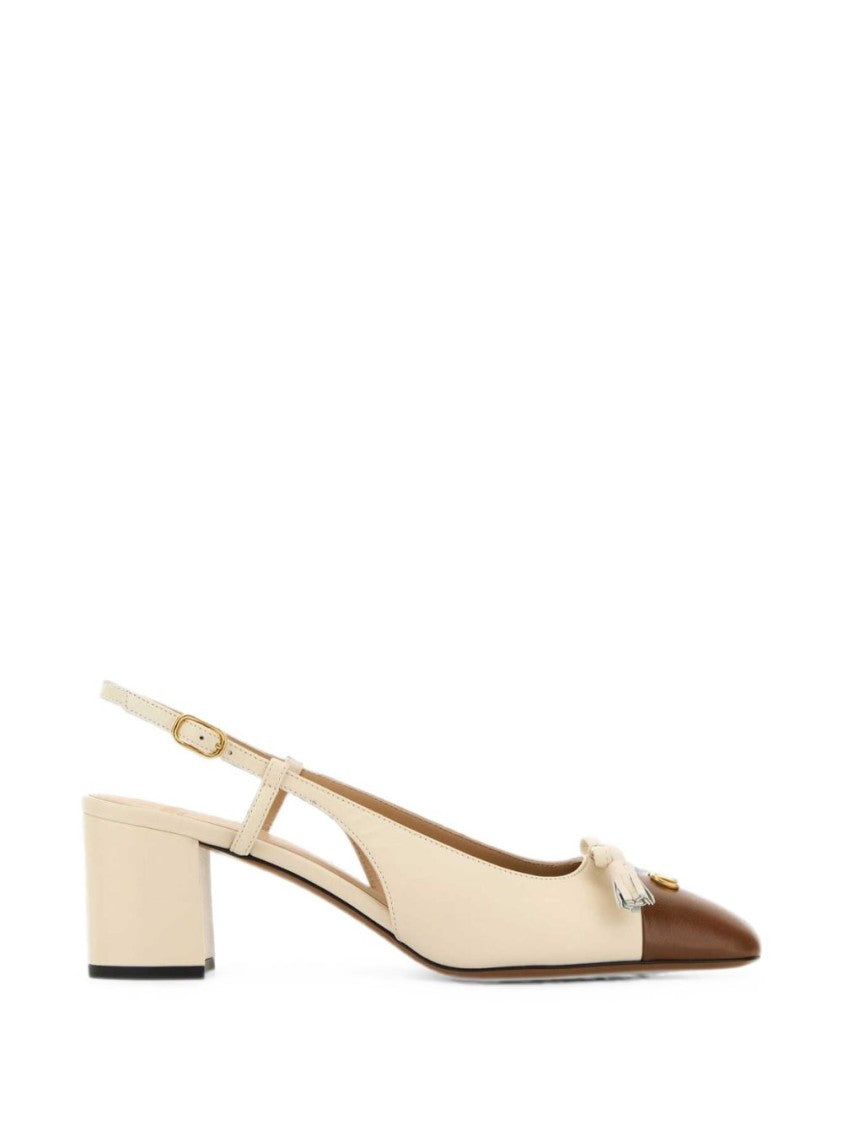 Valentino Garavani Pointed Toe Flat Shoes With Slingback Strap And Decorative Emblems