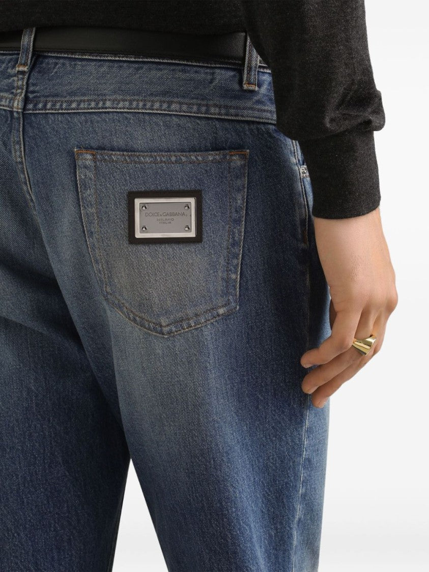 Dolce & Gabbana Faded Blue Denim Jeans With Logo Plaque