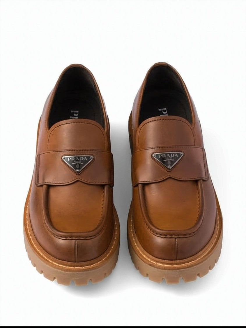 Prada Polished Calf Leather Loafers With Triangular Logo Plaque