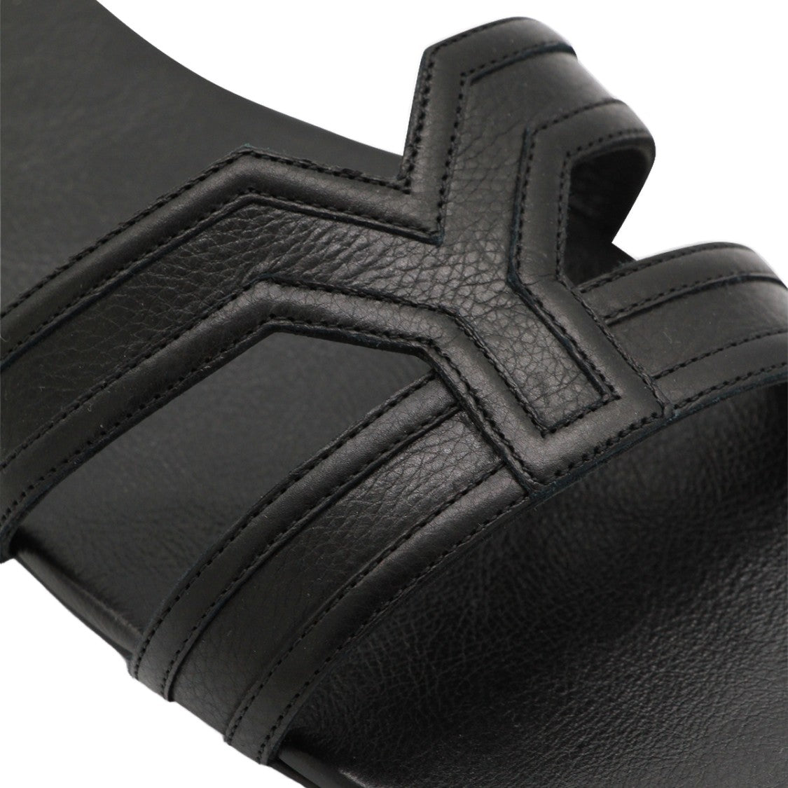 Saint Laurent Sleek Minimalist Black Flats With Textured Strap And Gold Accent