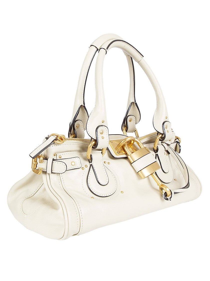Chloé Structured White Leather Handbag With Golden Accents And Versatile Carry Options
