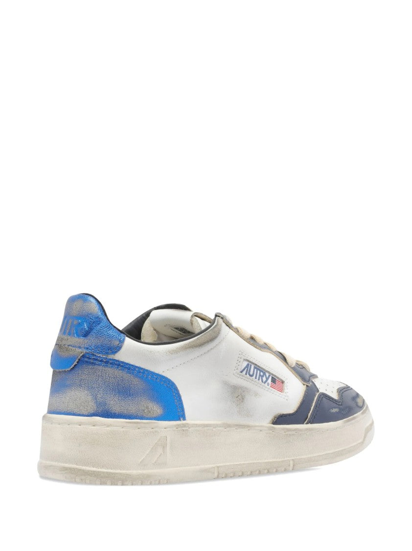 Autry Distressed White Leather Sneakers With Navy Accents