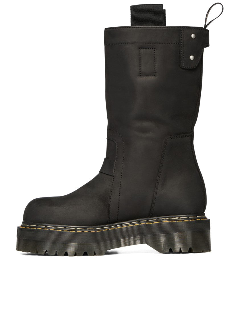 Dr. Martens Mid-Calf Pull-On Boots With Chunky Ridged Sole And Rugged Detailing