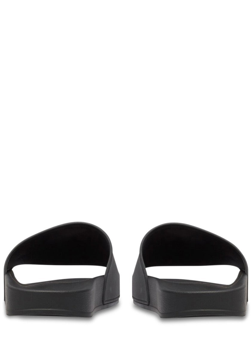 Balenciaga Contoured Black Slip-On Sandal With Bold Logo Print