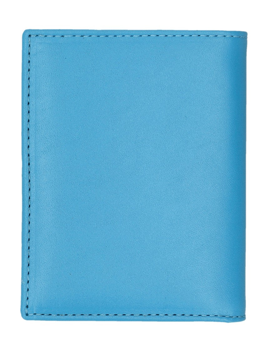 Comme Des Garçons Bifold Wallet With Vibrant Blue Exterior