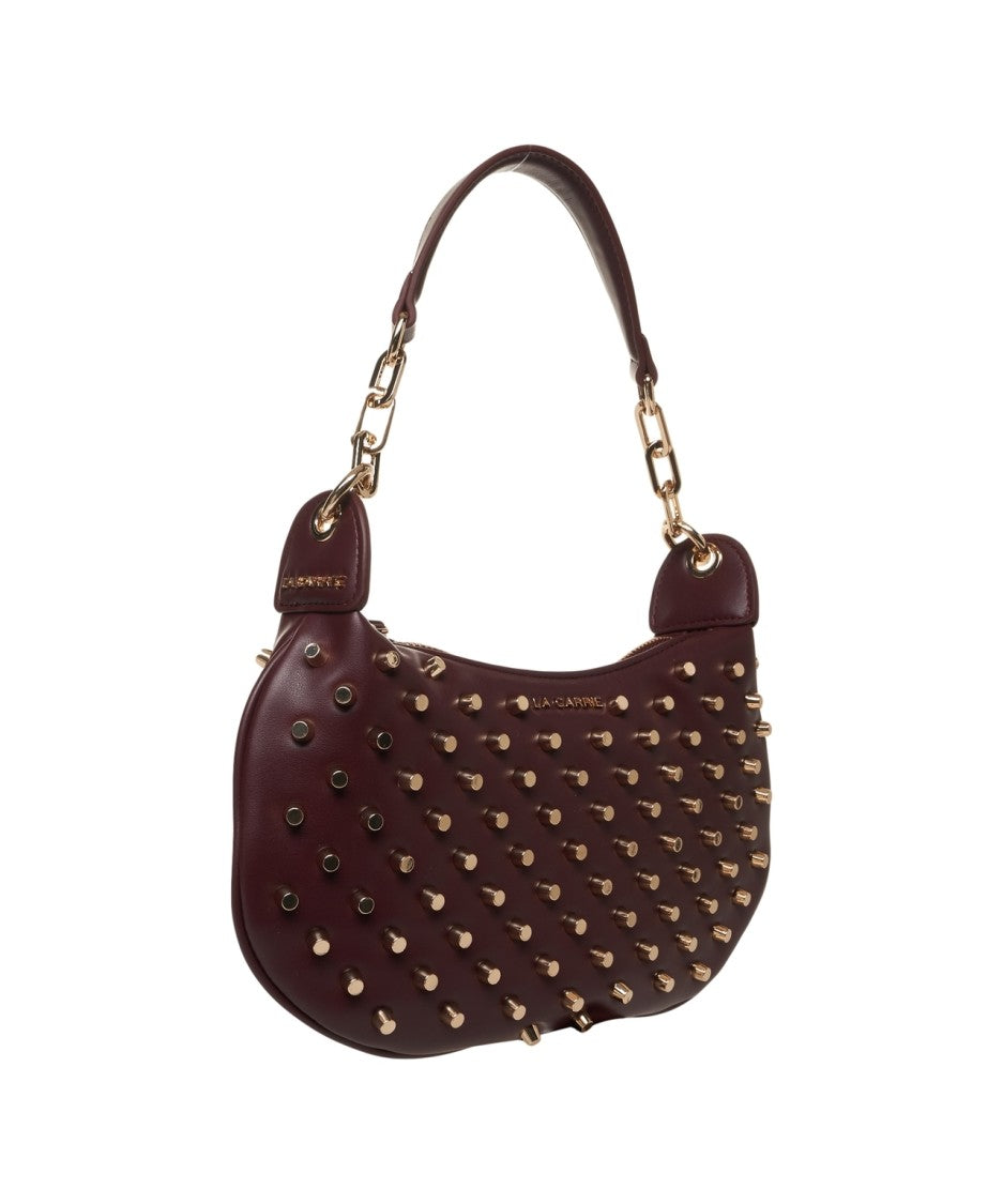 La Carrie Crescent Shoulder Bag In Rosso With Metal Studs