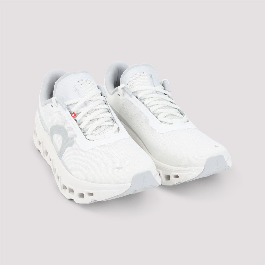On Lightweight White Sneakers With Distinctive Cushioning Sole