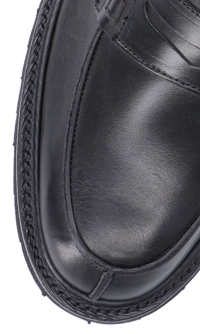 Tricker's Sleek Leather Penny Loafers With Sturdy Rubber Sole