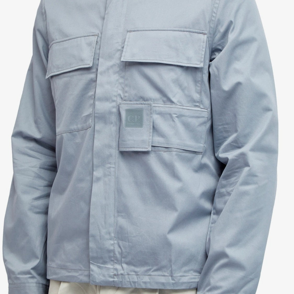 C.P. Company Light Blue Minimalist Jacket With Structured Collar And Flap Pockets
