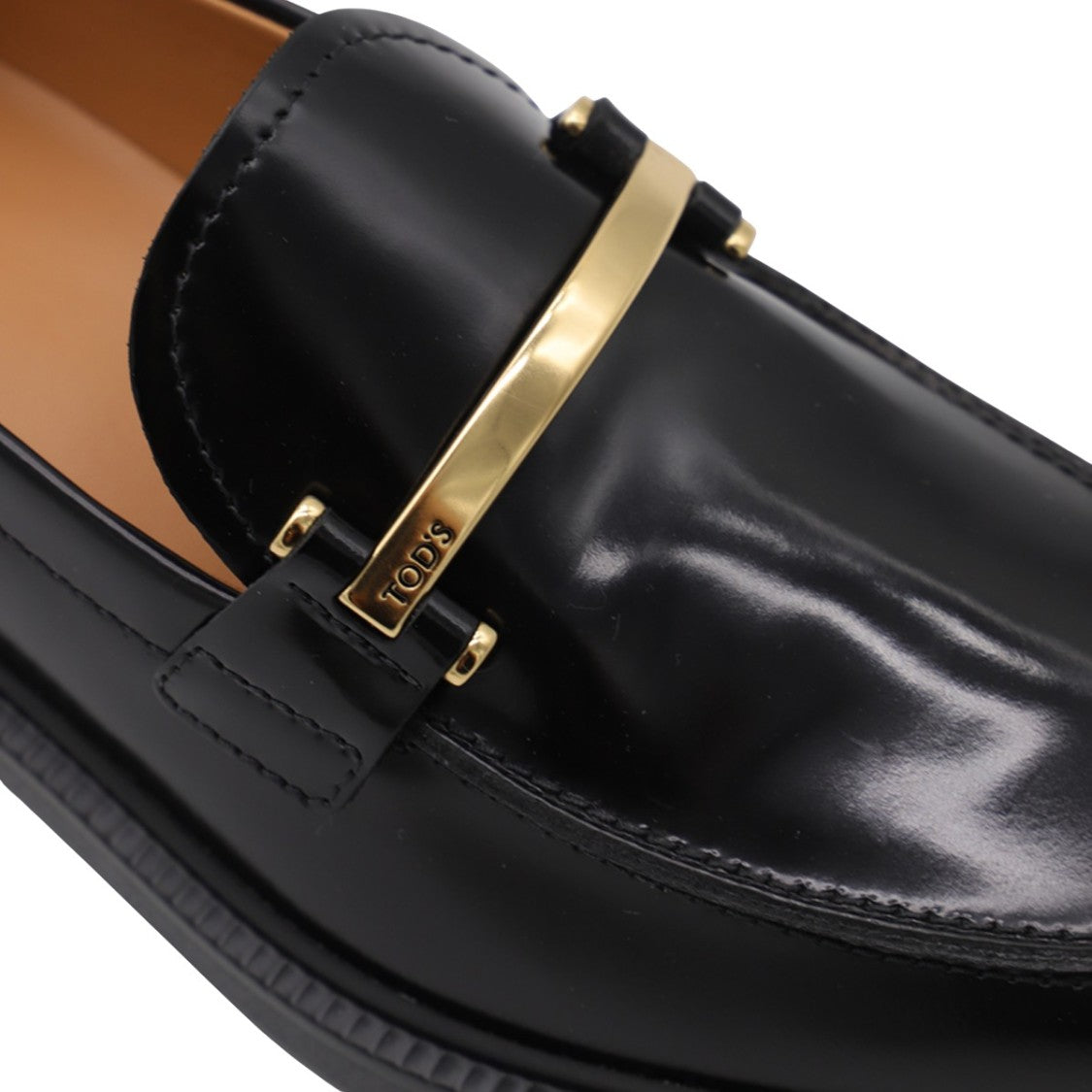 Tod's Polished Black Leather Flat Shoes
