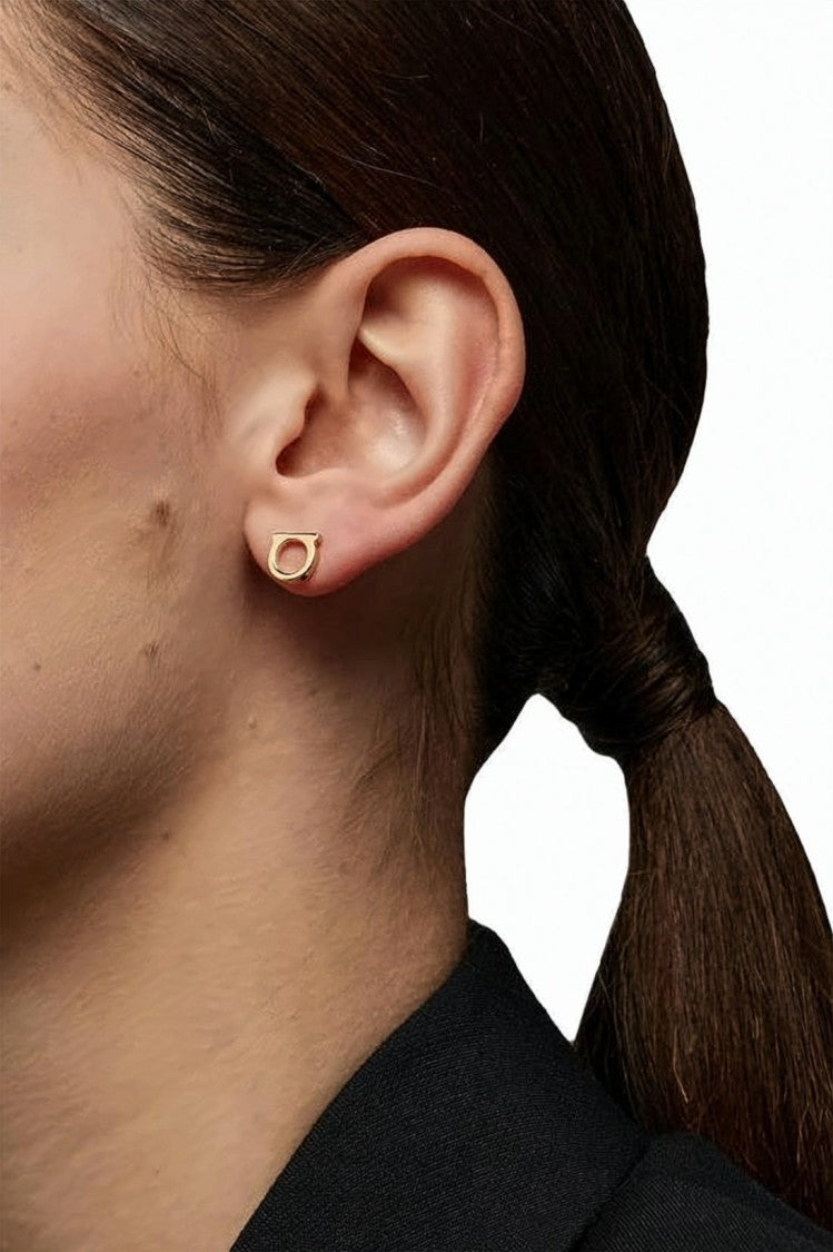 Salvatore Ferragamo Polished Brass Stud Earrings With Open Oval Design