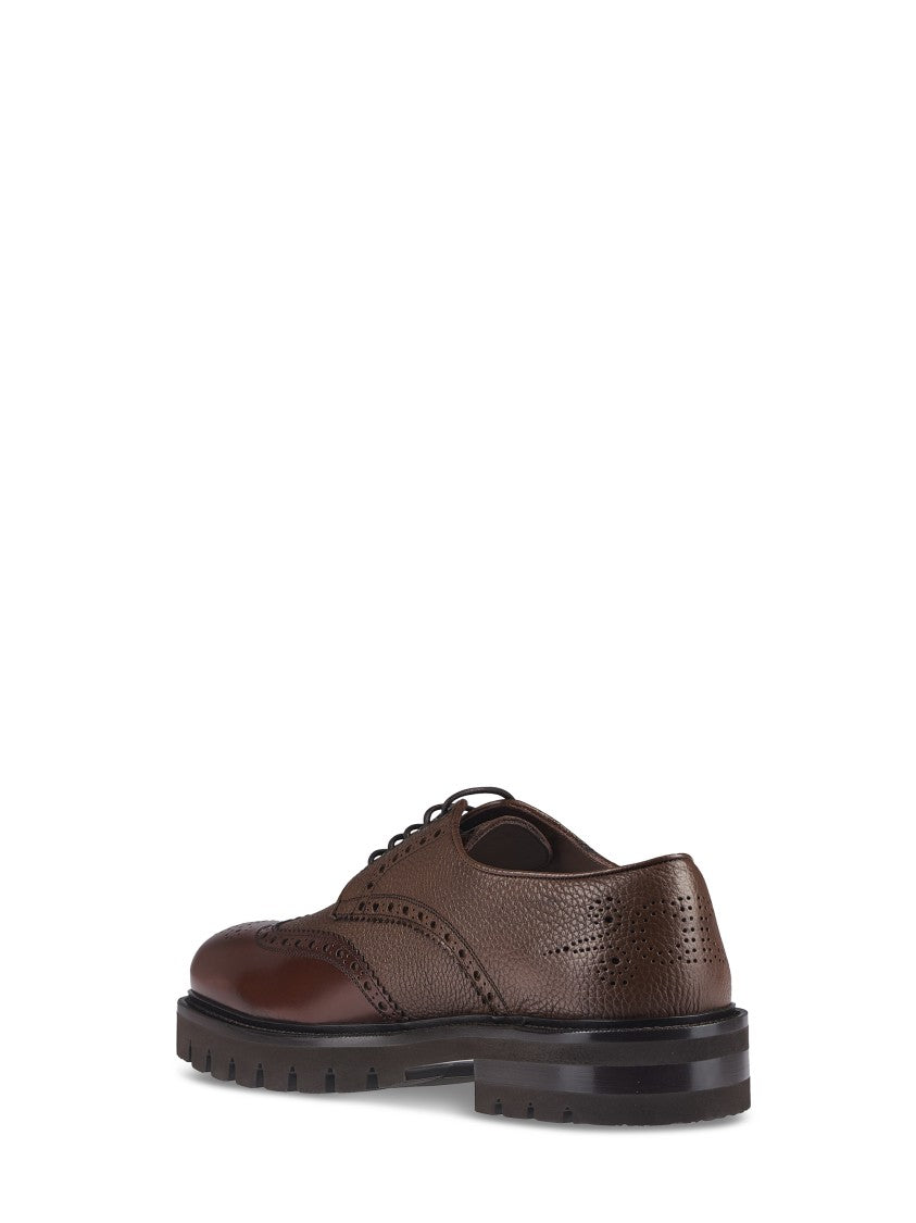 Ferragamo Brogue Leather Flat Shoes With Intricate Perforations
