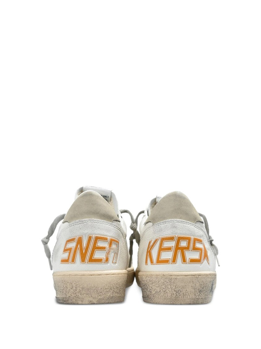 Golden Goose Distressed Low-Top Sneakers With Star Detail And Vintage Aesthetic